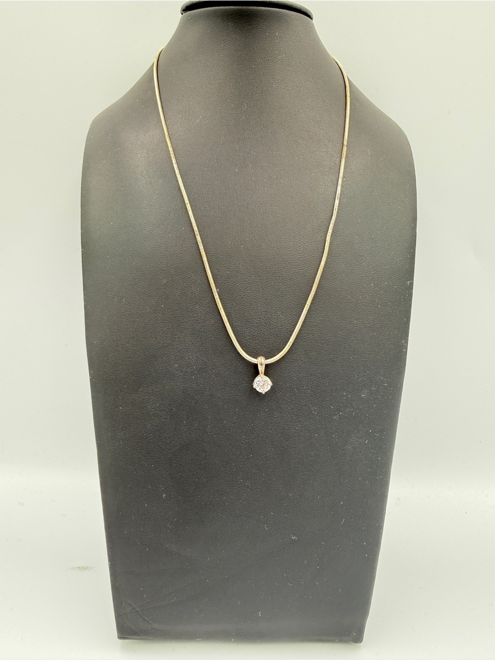 Delicate Gold Pendant Necklace with Clear Stone